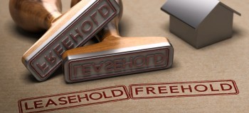 Two words, leasehold and freehold printed on a brown paper with two rubber stamps  3d illustration 