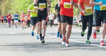 Marathon, street runners in spring day