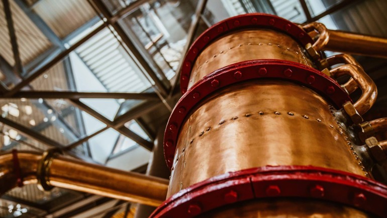 tall bronze barrel below skylight scaled