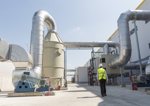 New modern industrial waste plant pipelines from the outside  Waste to energy plant  Produces a combustible fuel commodity, such as methane, methanol, ethanol and synthetic fuels